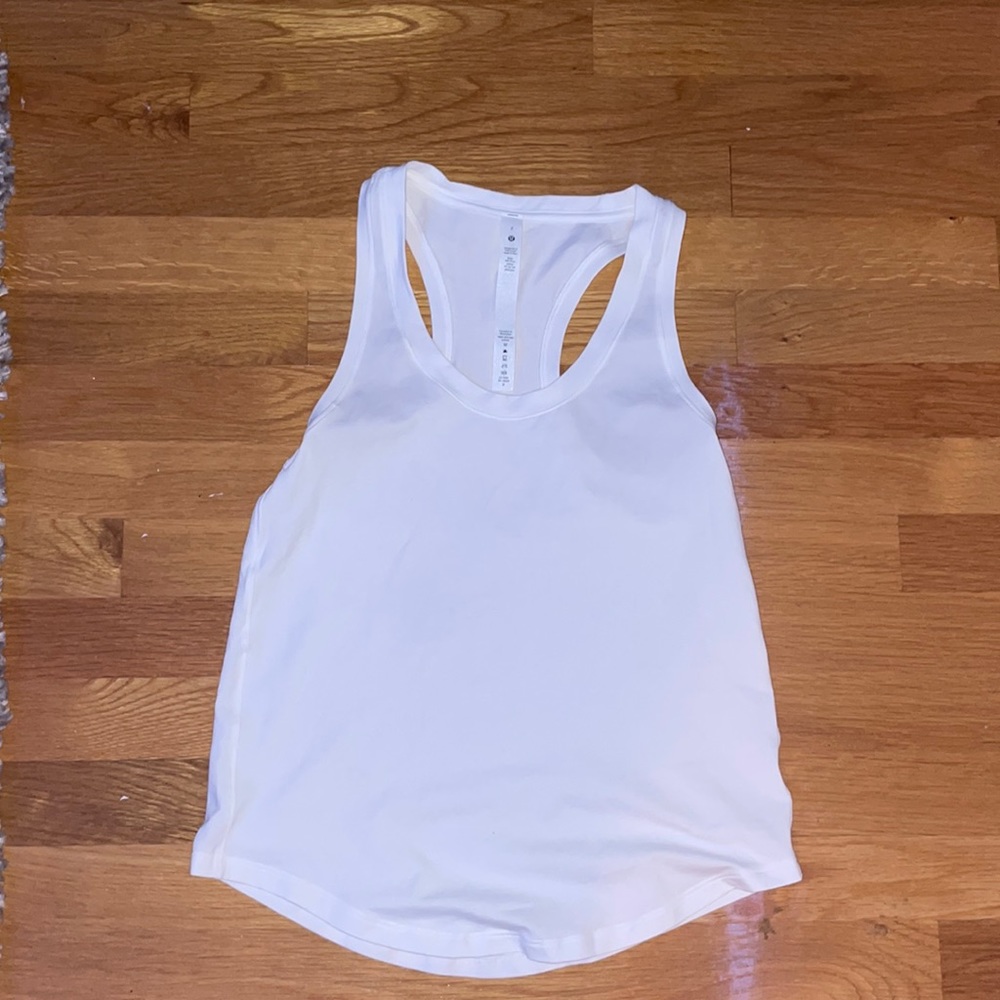 white lululemon waist length tank top